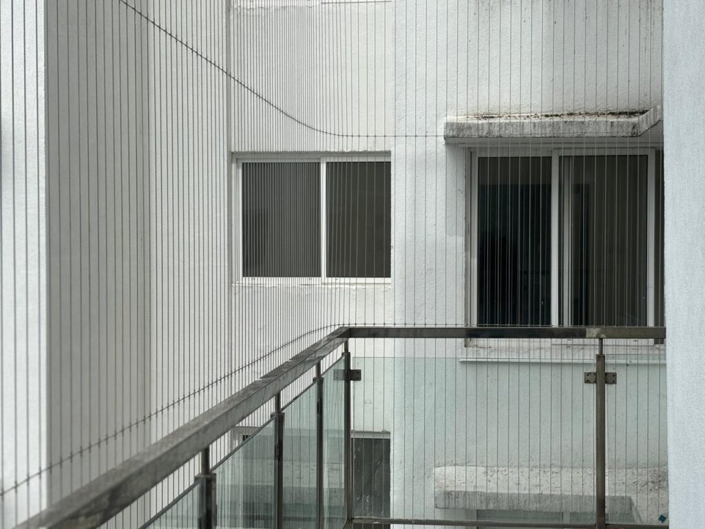High-quality invisible grill for balcony safety installation service in Coimbatore