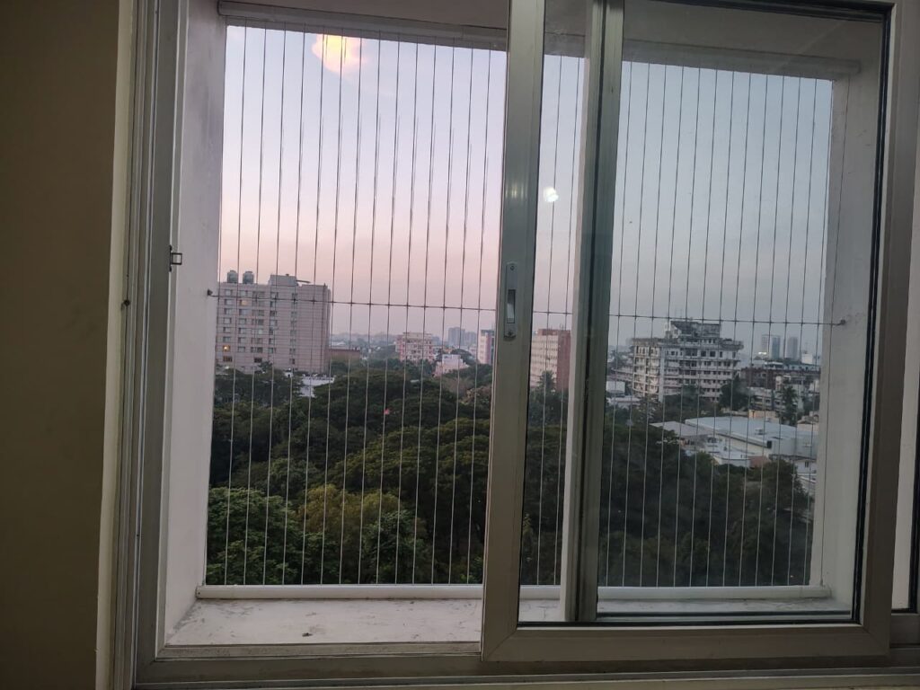Invisible grills for colleges in Madurai, window installation done by GSA Enterprise